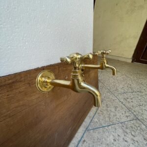 Unlacquered brass wall faucets - Unlacquered plain end faucet.